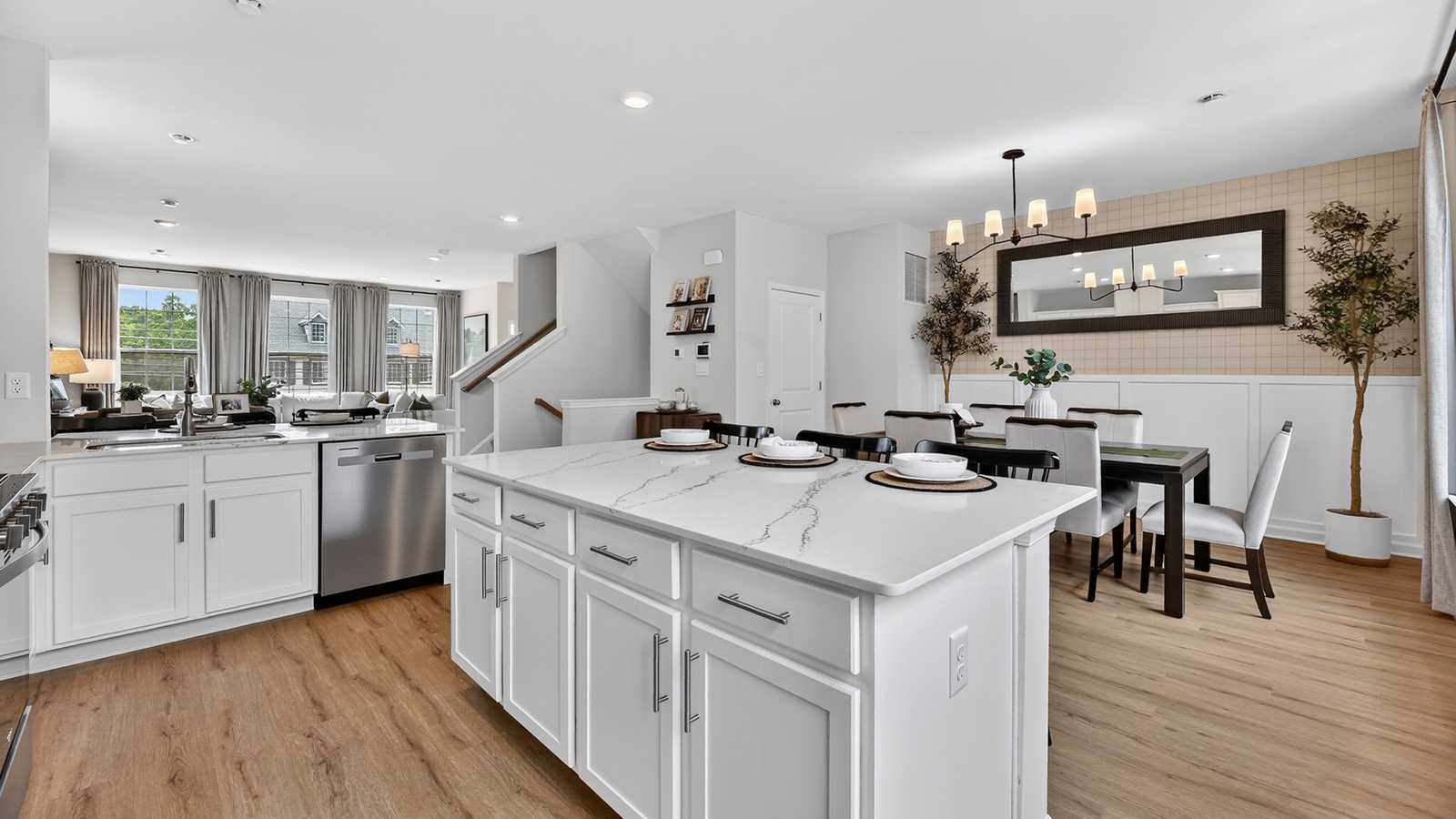 Elmore model main floor living with mid century modern design and large quartz island