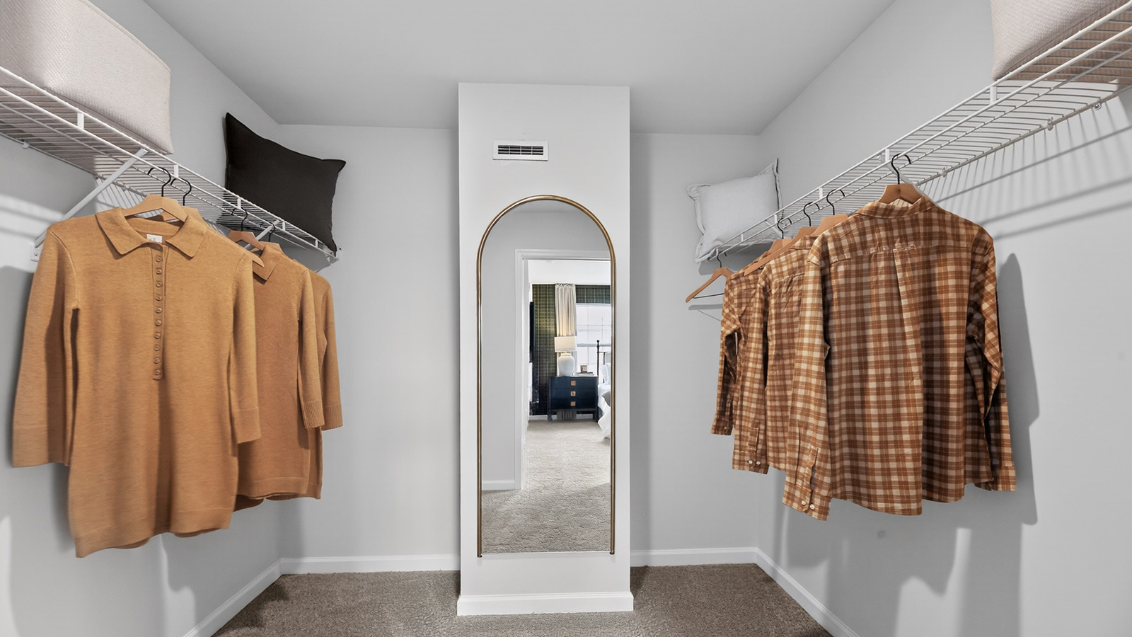 walk in closet in the primary bedroom Elmore model