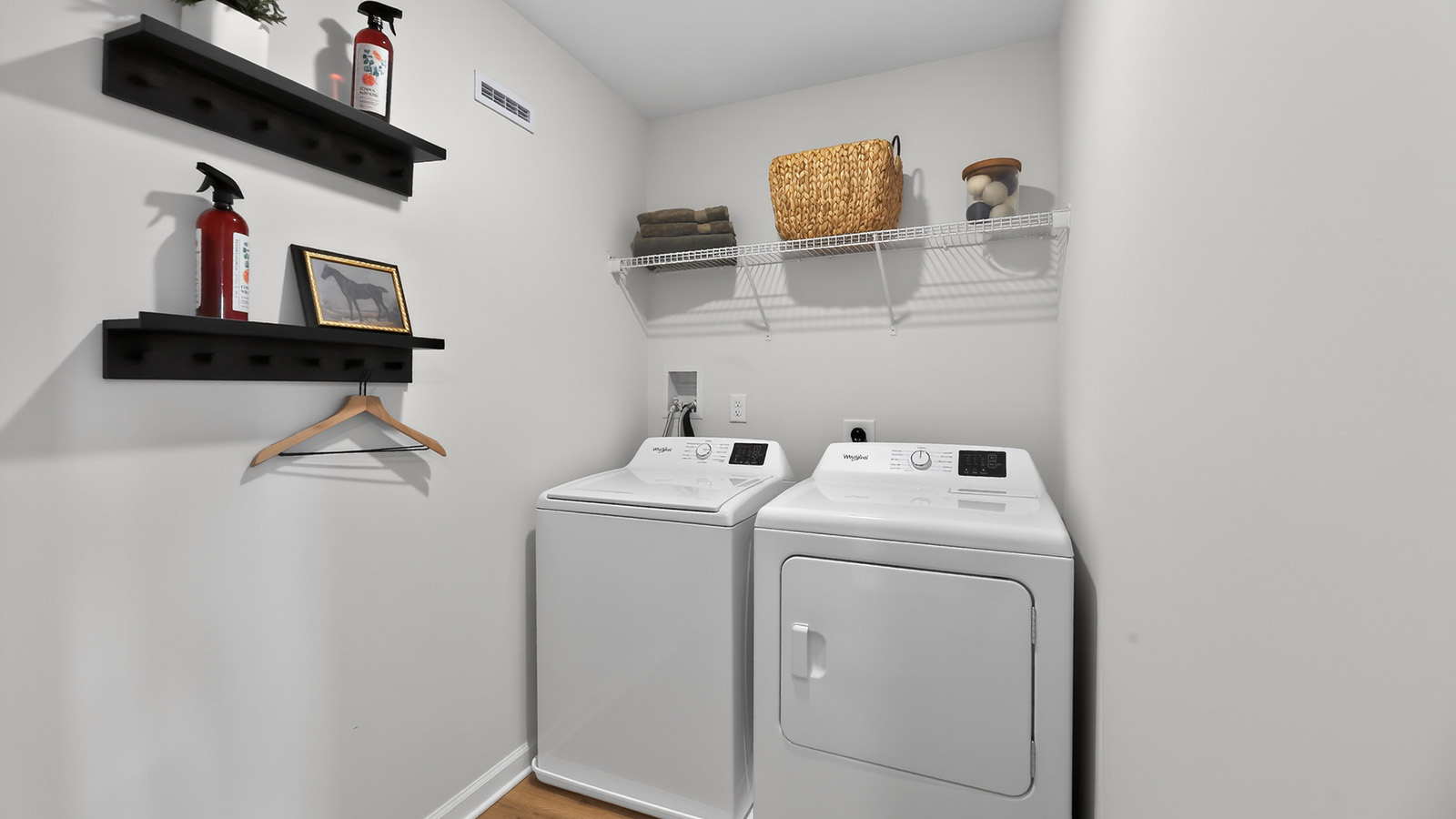 Elmore model laundry room with extra space for storage