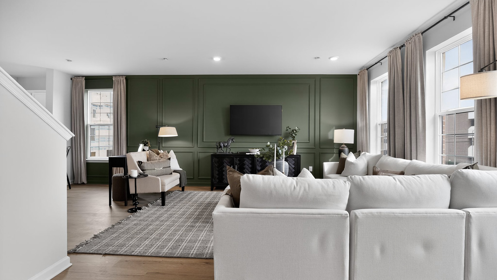 Elmore model main floor living with mid century modern design