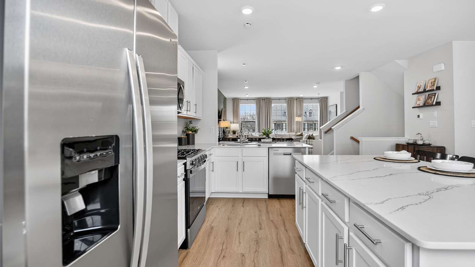 Elmore model main floor living with mid century modern design and large quartz island