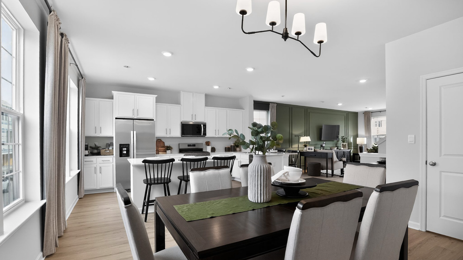 Elmore model main floor living with mid century modern design and large dining table