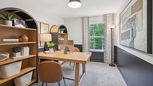 bedroom with beige carpet