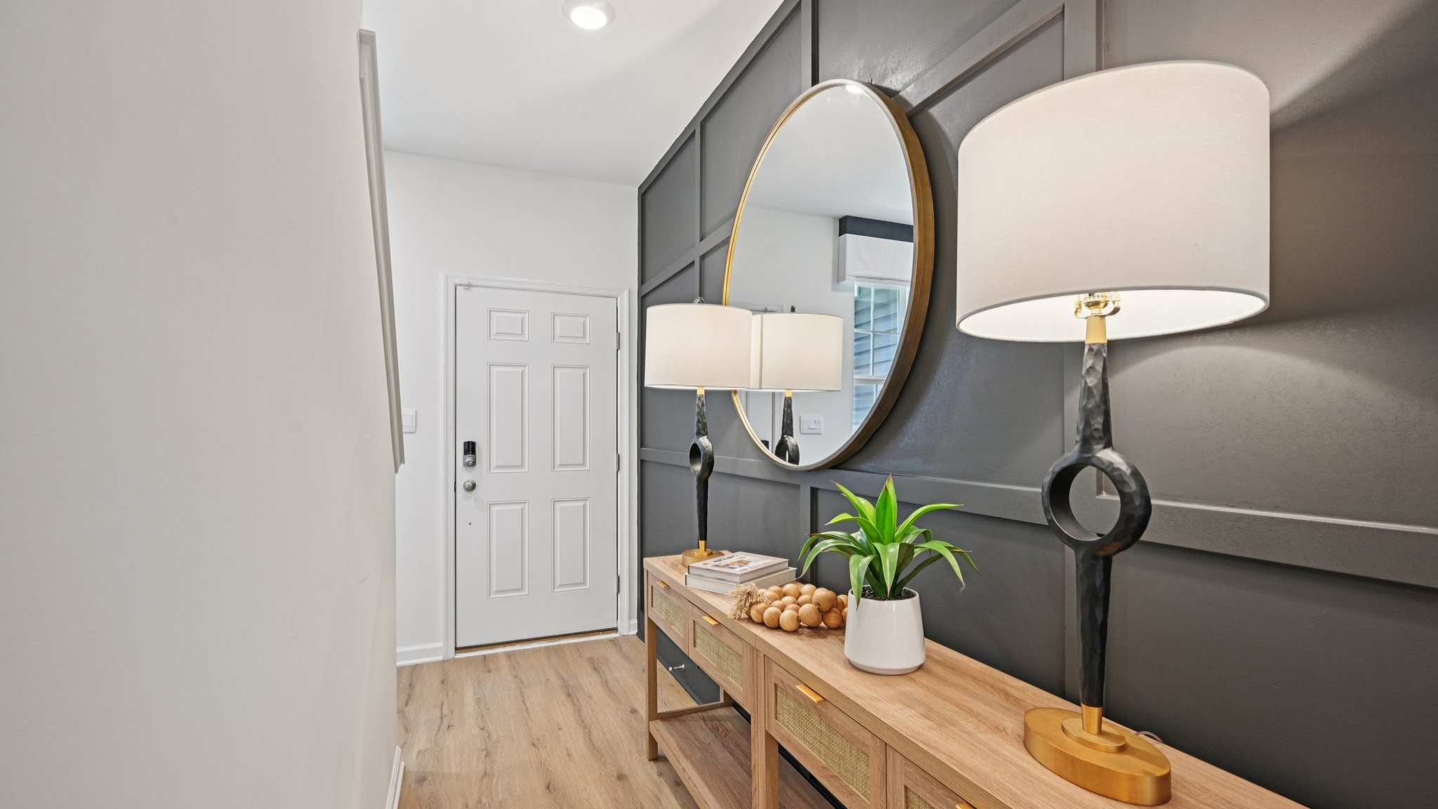 modern and bold front entrance with charcoal feature wall