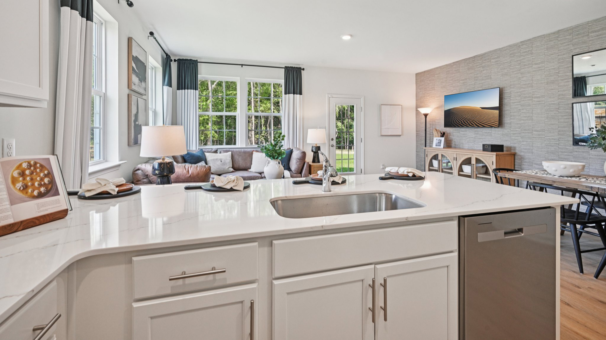 large kitchen island overlooking the living spaces