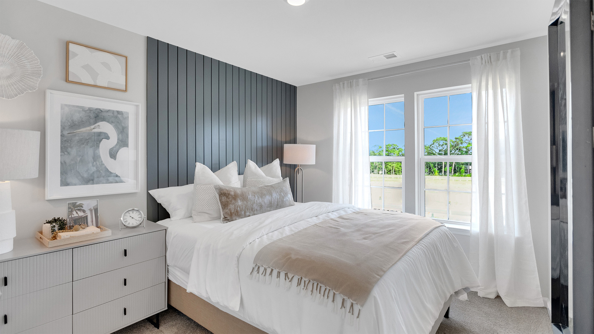 modern bedroom with large windows