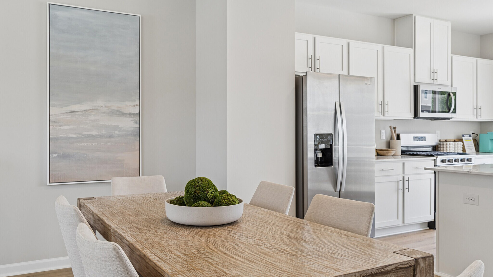 dining table and kitchen with large island