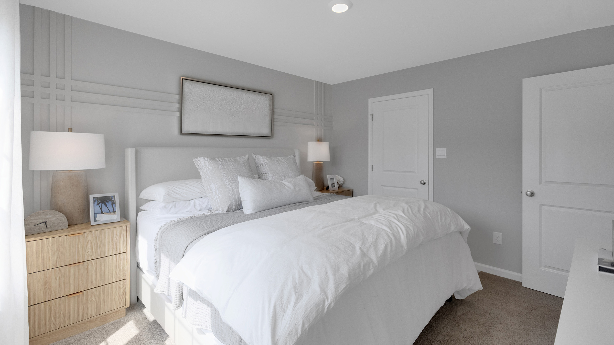 primary bedroom with ample space and a full bath and spacious closet