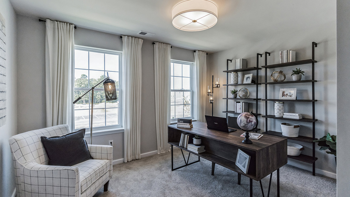 office with modern decor and large windows