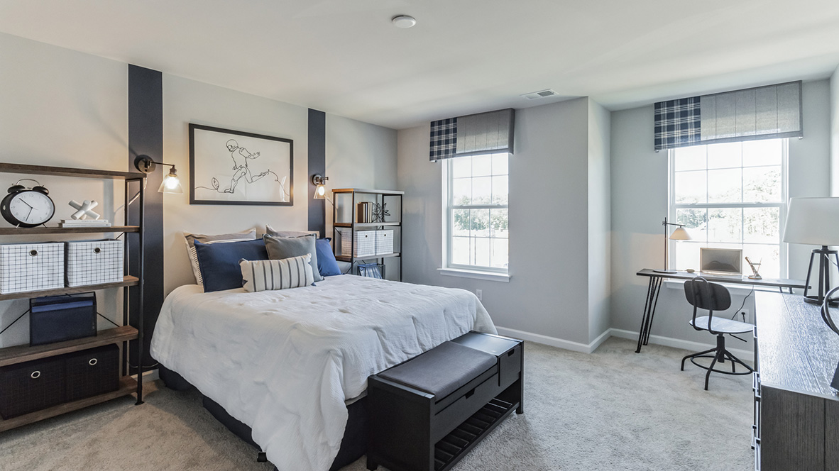 large bedroom with windows