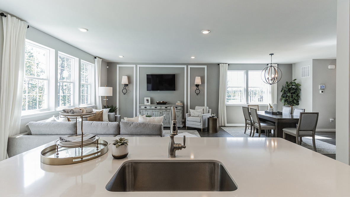 kitchen island overlooking the open concept living room