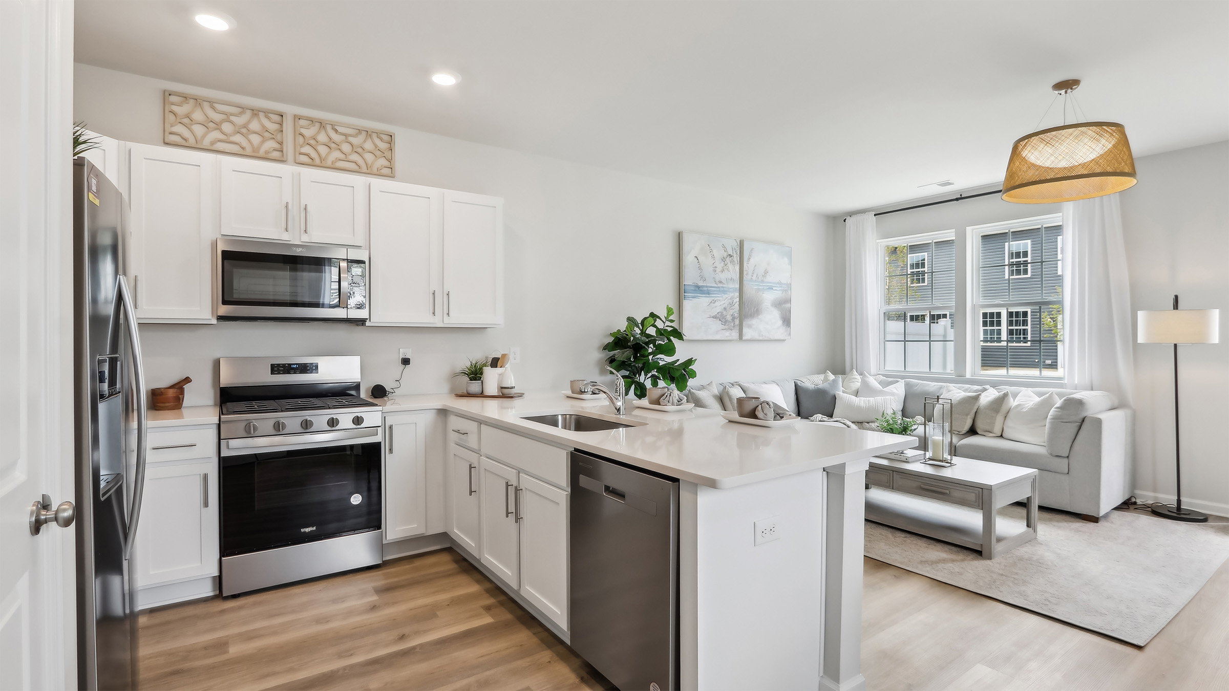 spacious first floor layout with open concept living room and kitchen