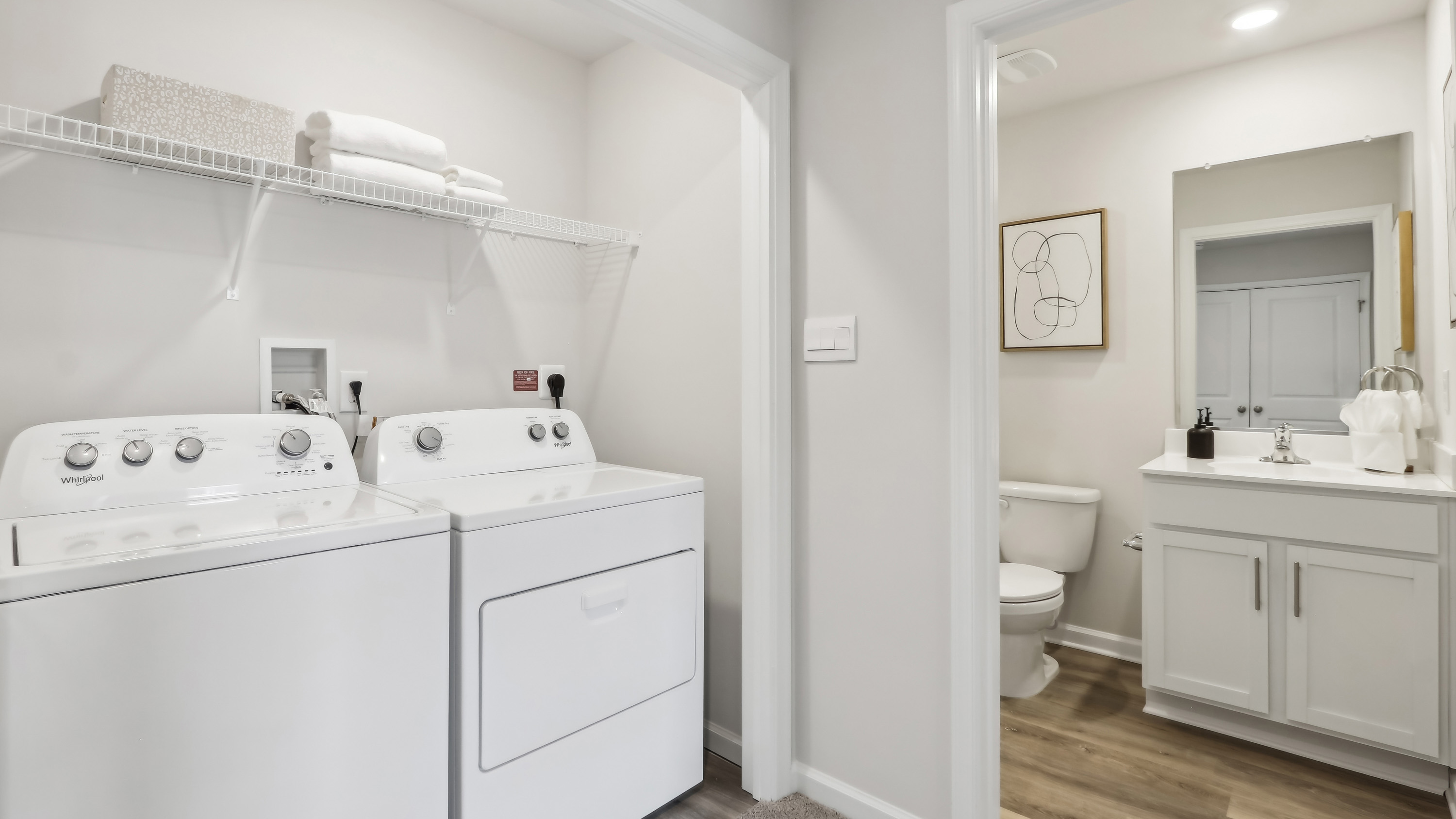 large hall full bath and laundry on the second floor