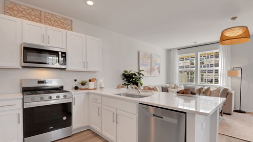 white kitchen with white island