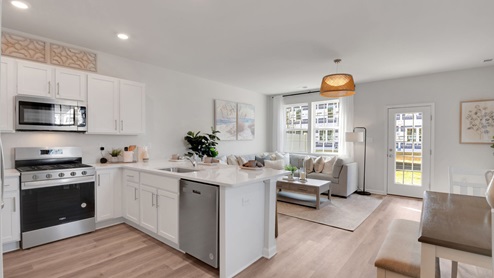 white kitchen with white island