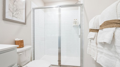 en suite bathroom with glass shower