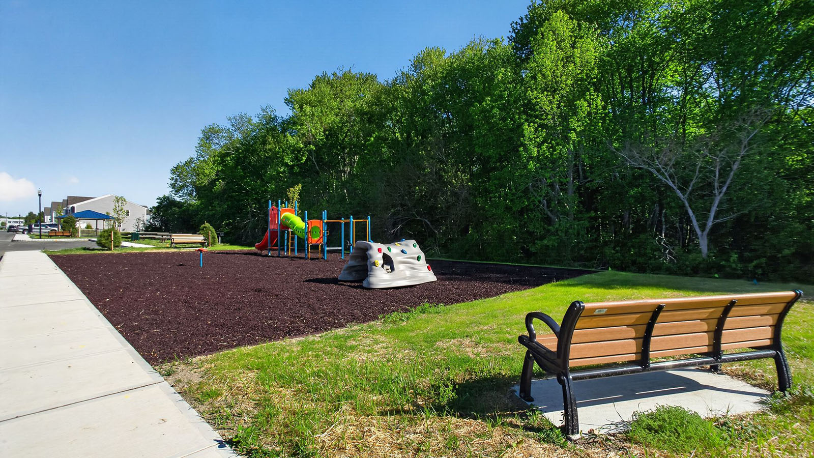 playground at coastal crossing with benches