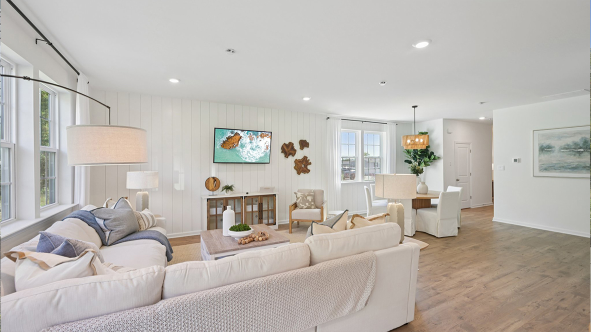 open concept living room with modern and coastal design