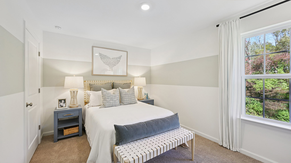 spacious bedroom with coastal design