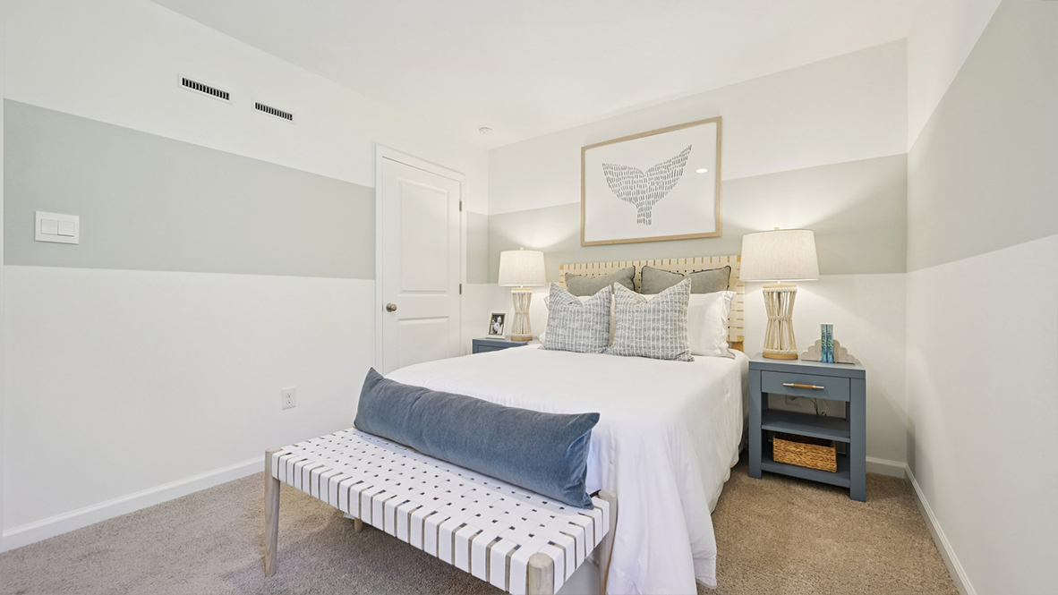 spacious bedroom with coastal design