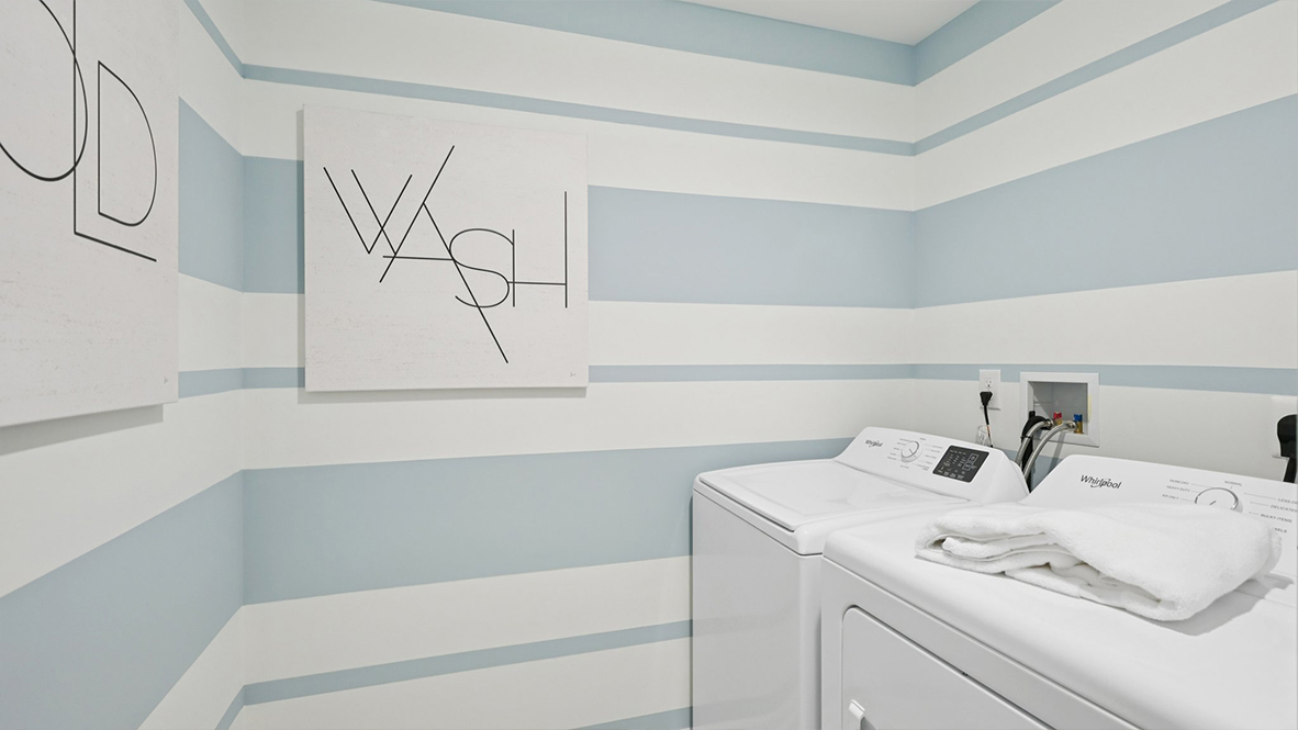 laundry room with blue and white stripes
