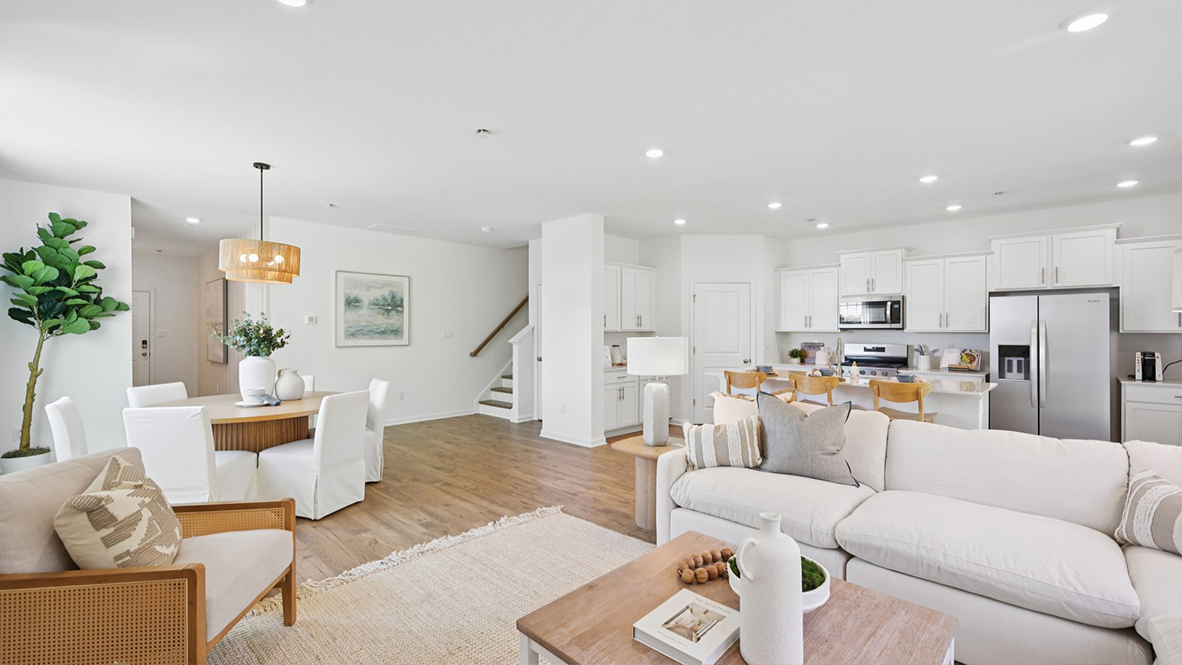 open concept living room with cozy and modern touches