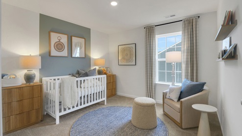bedroom with beige carpet