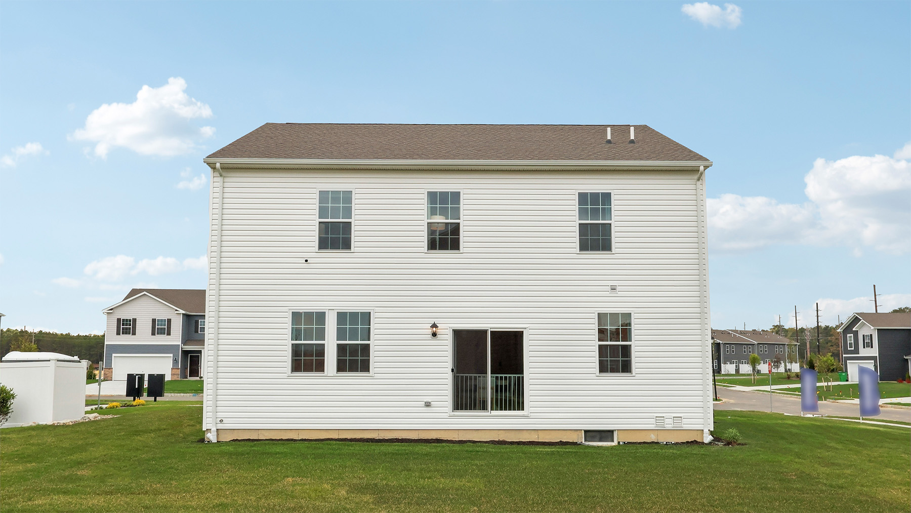 exterior of a galen model at winds at ocean club showcasing the yard space
