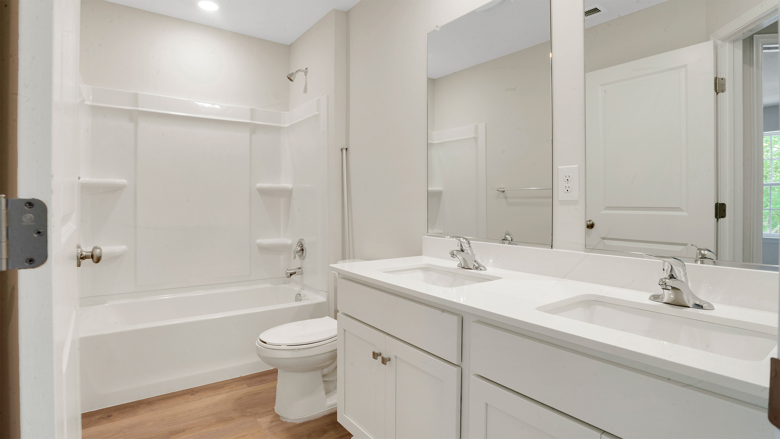 full bathroom with double vanity