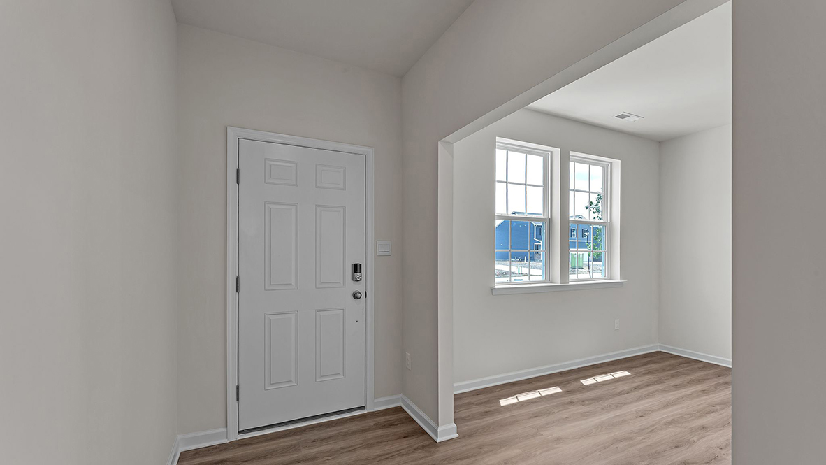 modern front entrance with the flex room to the side