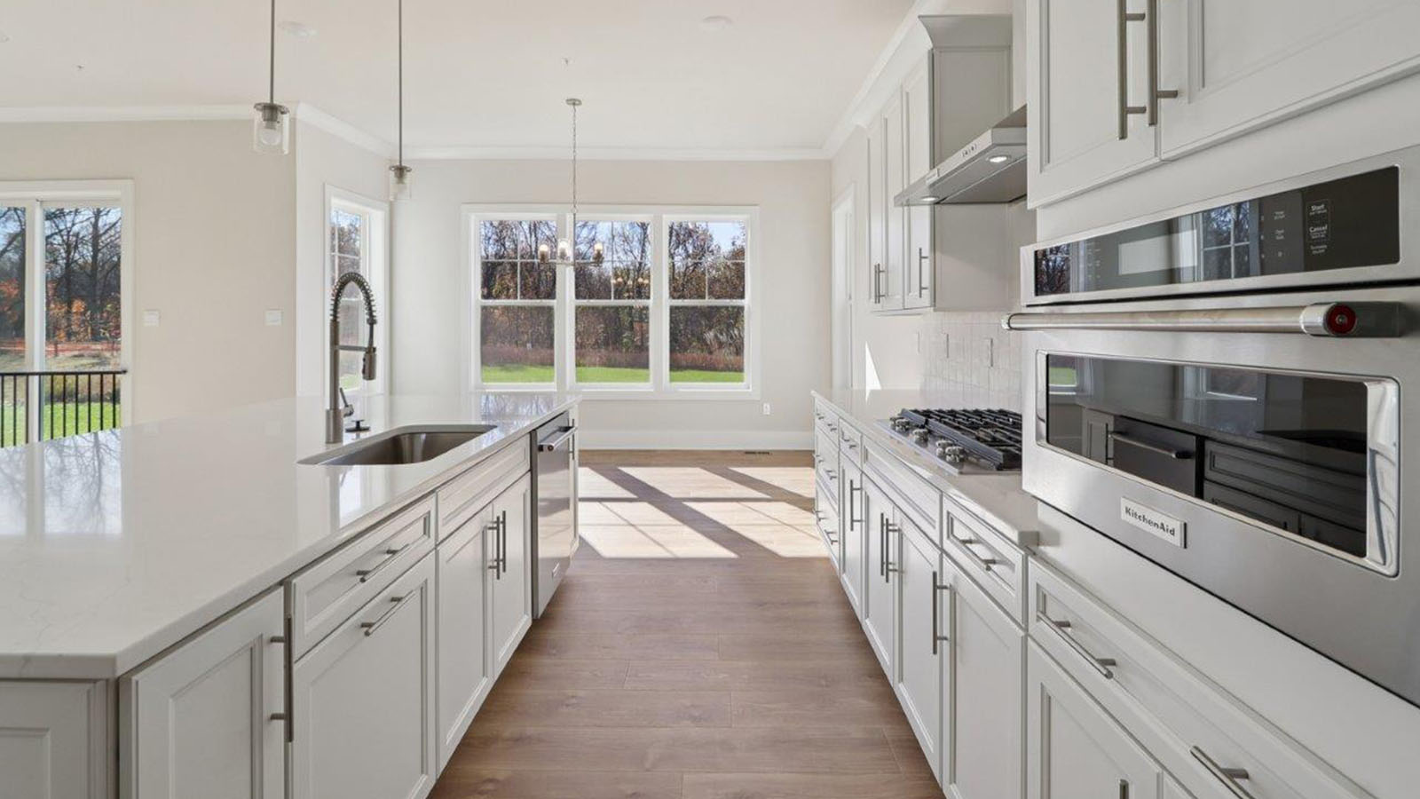 spacious kitchen island and cabinets