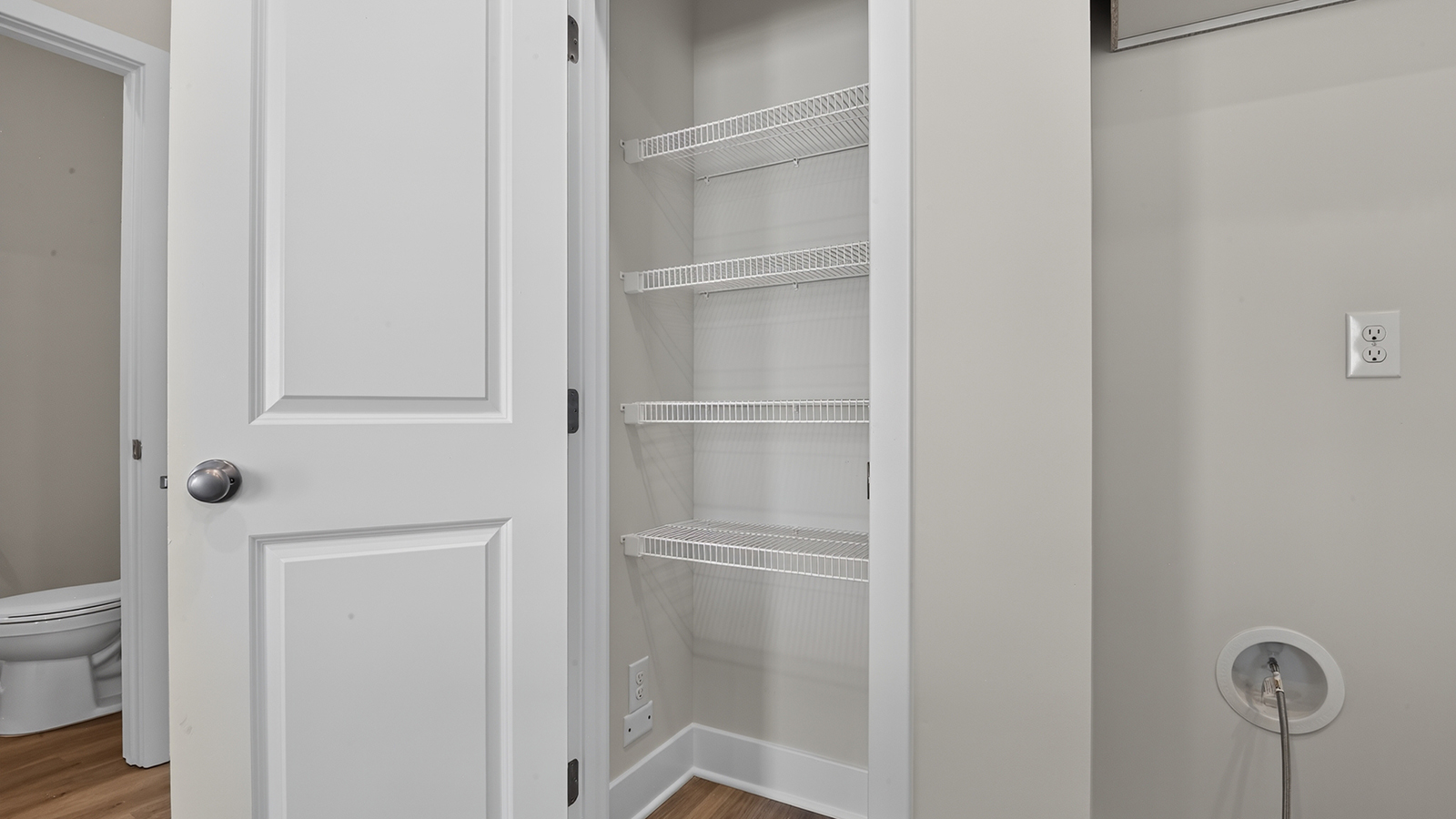 second floor linen closet and laundry unit