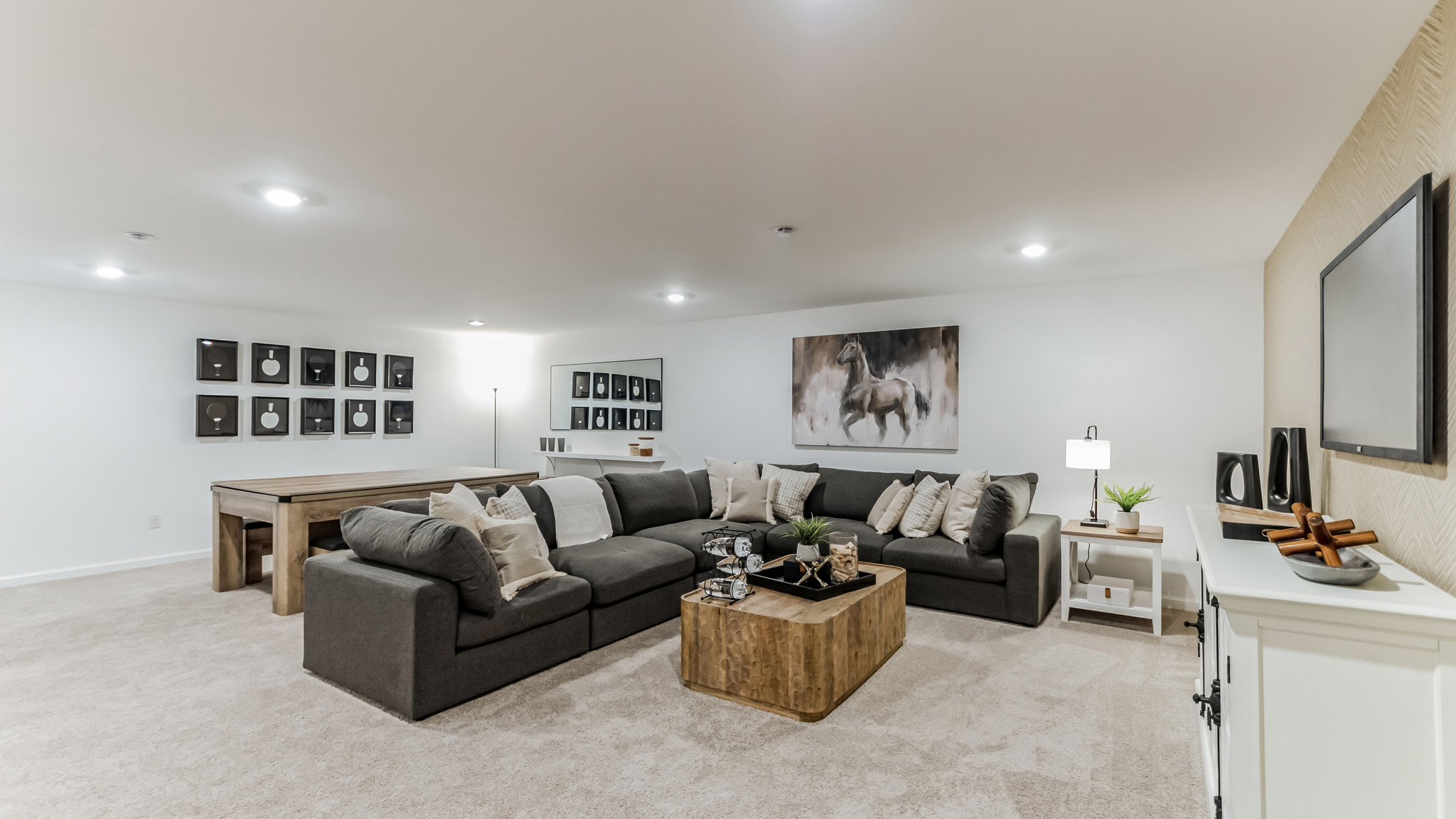 basement with modern design featuring a lounge area and pool table for entertaining