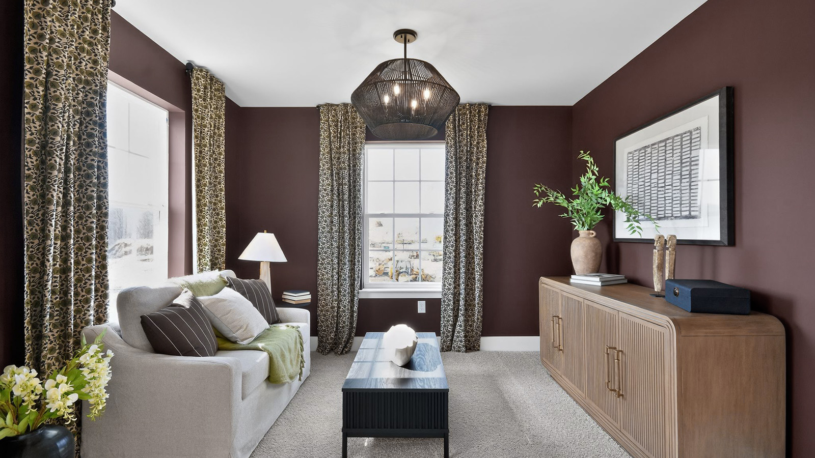 sitting area in the primary suite with bold and modern design