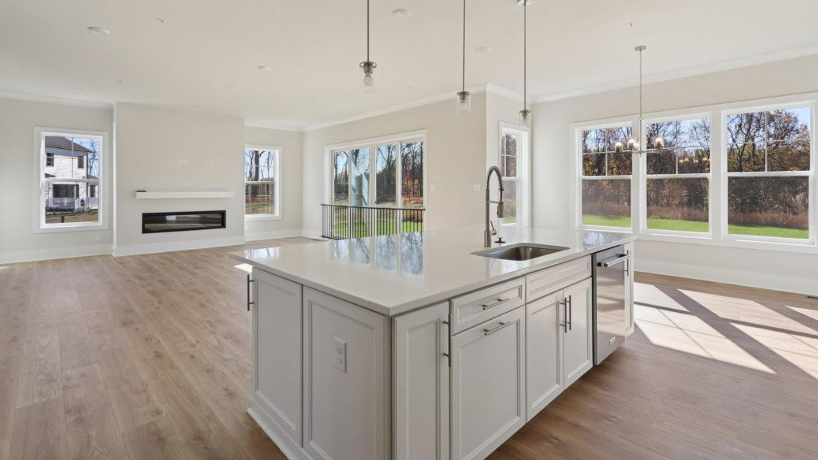 spacious first floor featuring the large kitchen island and open concept living room