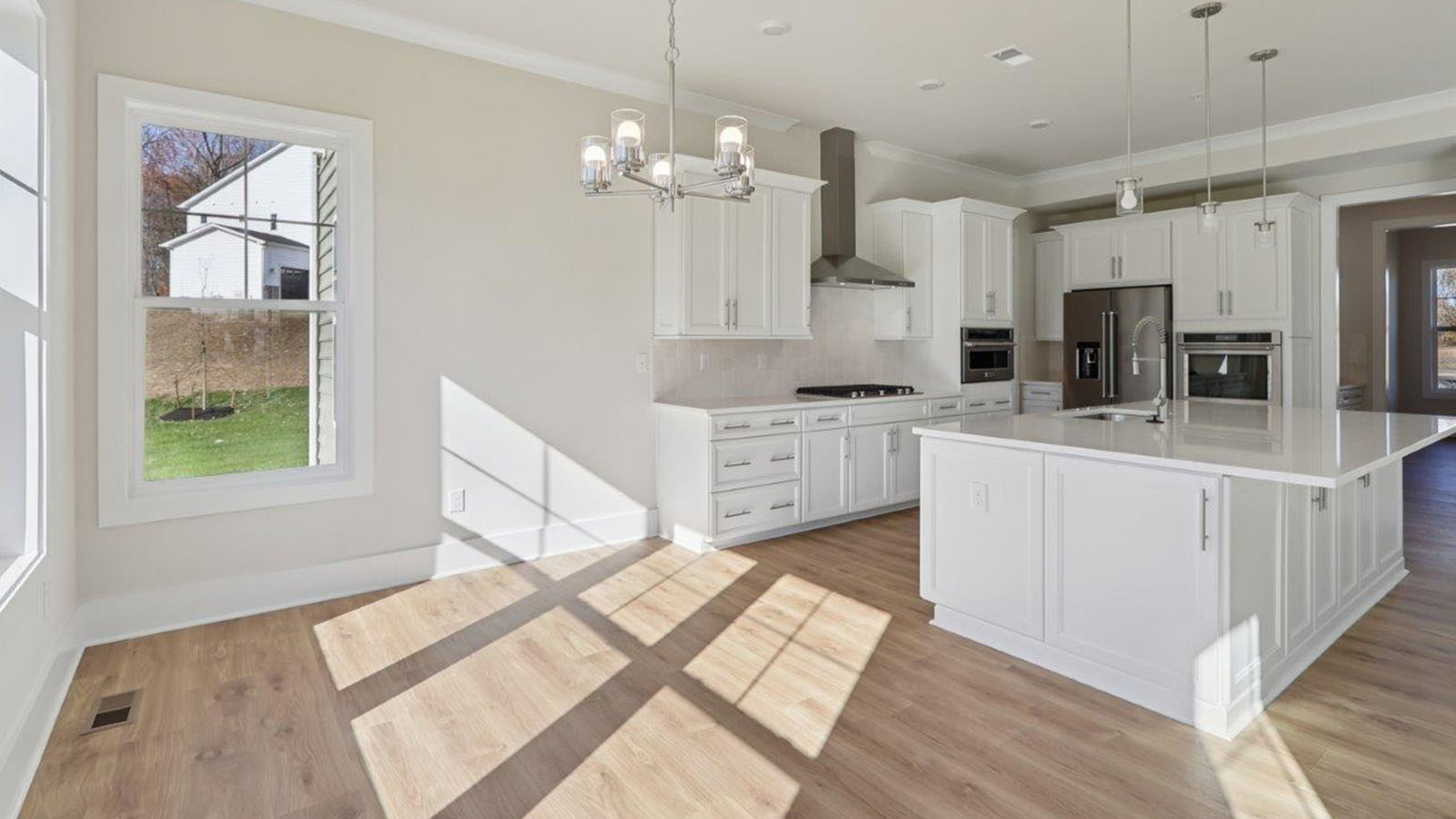 spacious first floor featuring the large kitchen island and open concept living room