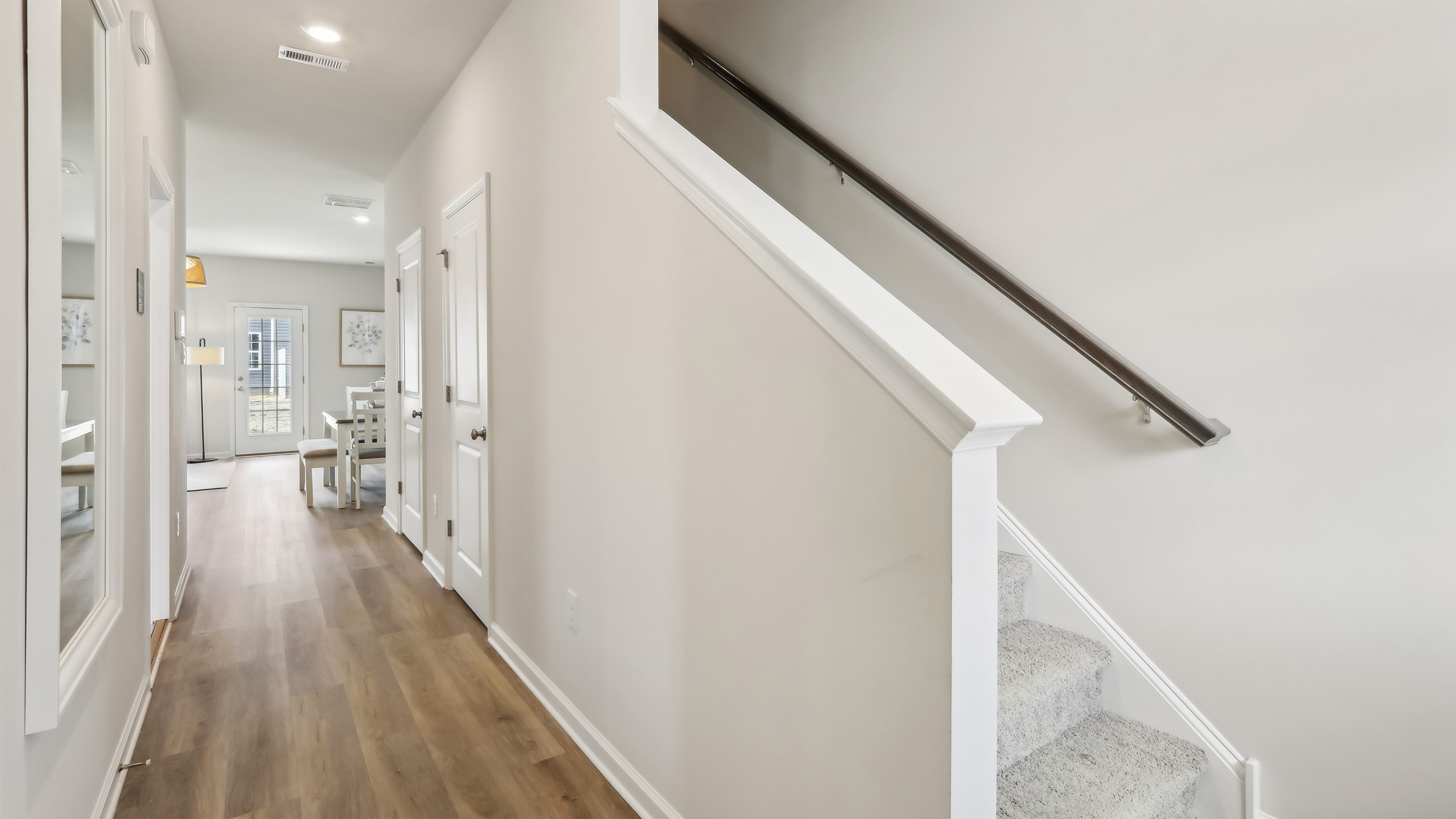 first floor hall and stairs leading to the second floor