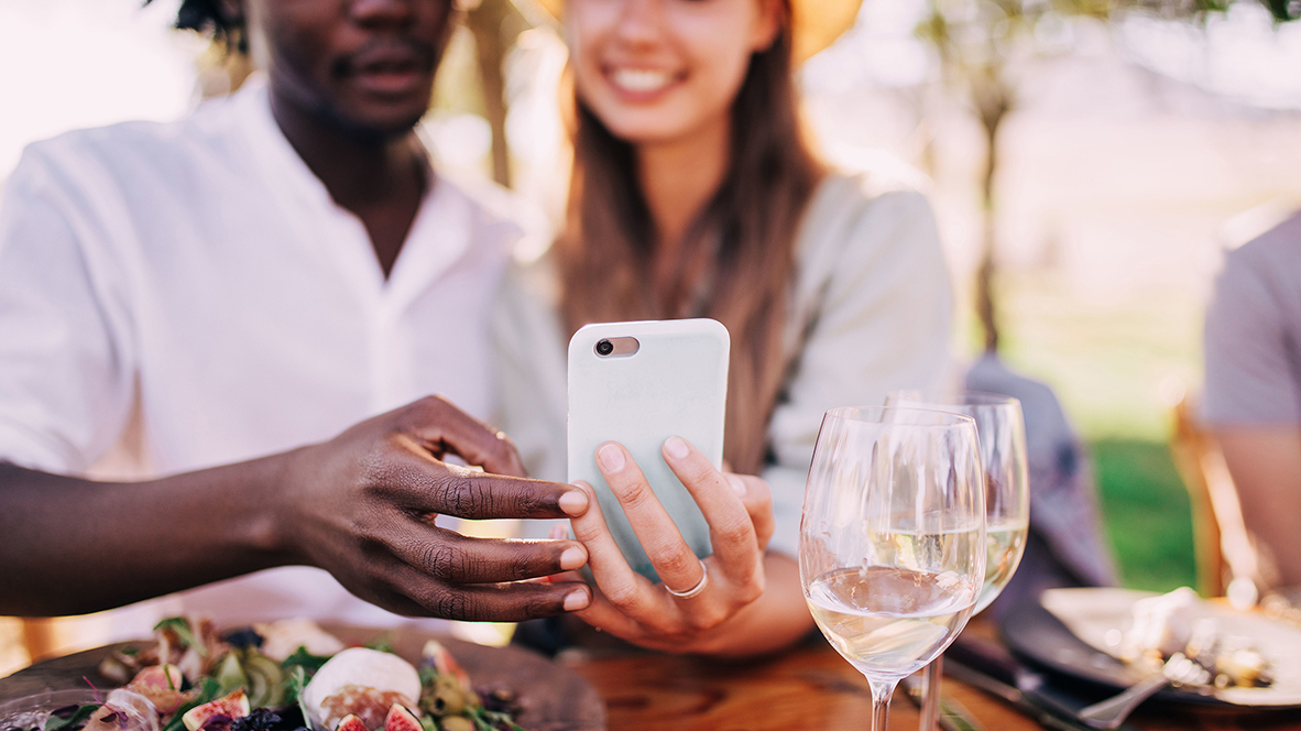 couple at lunch laughing