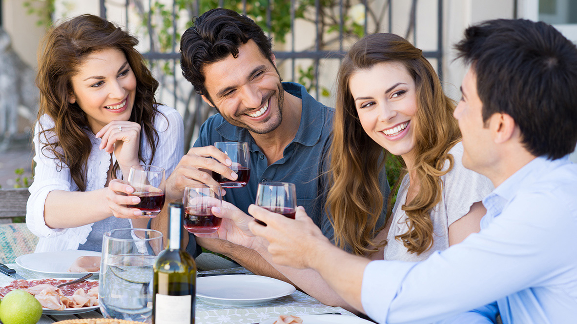 friends making a toast at dinner