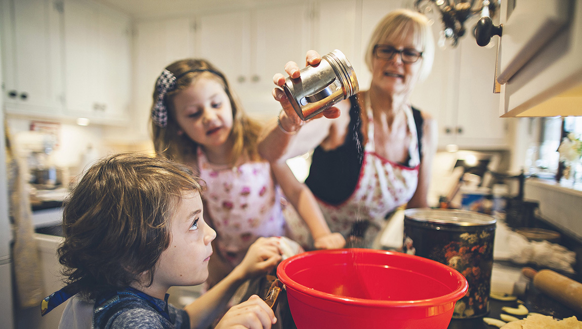 grandma and grandchildren cooking