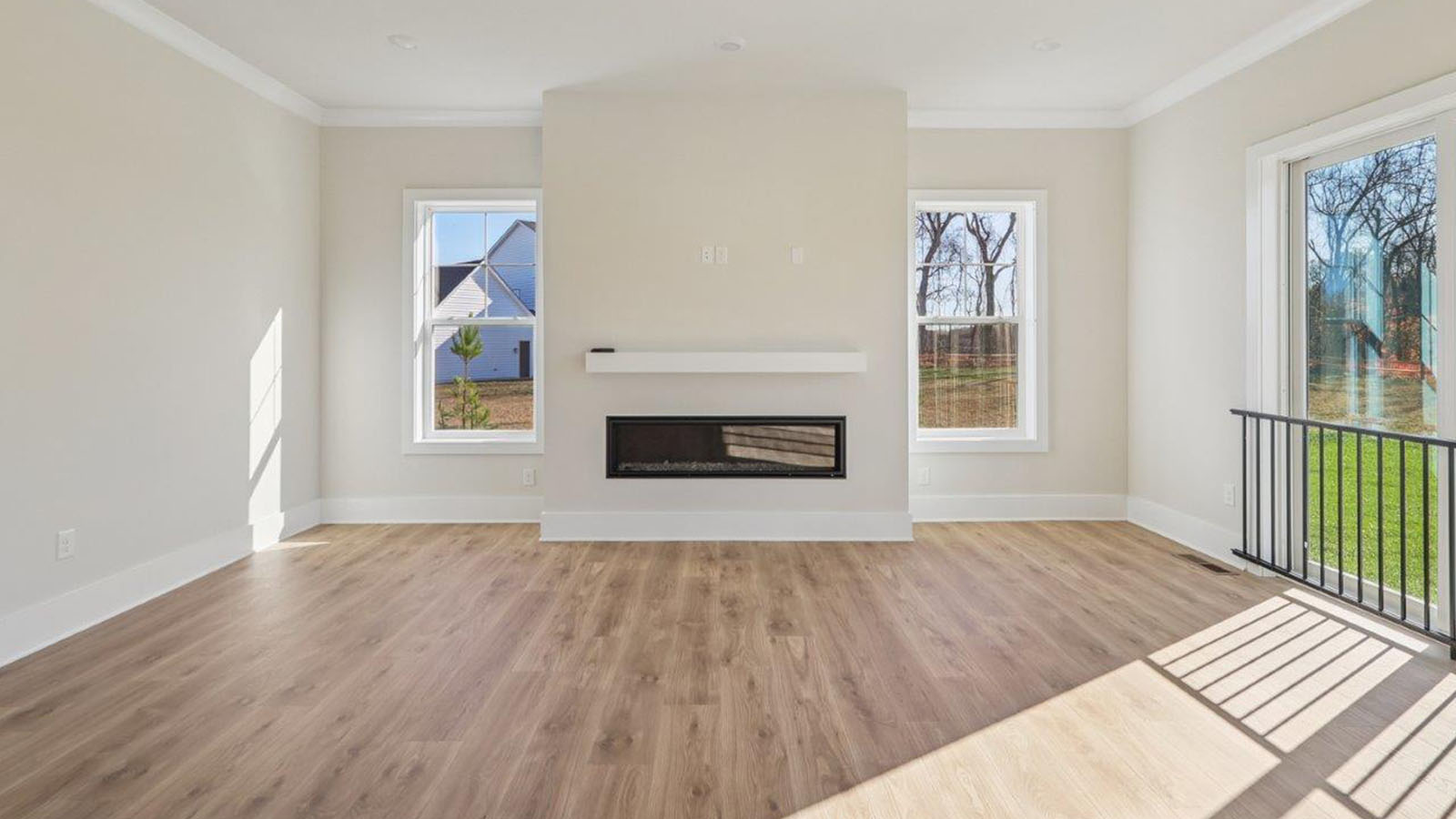 beautiful open concept living room and fireplace feature