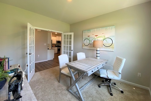 The inviting flex room is a versatile space.