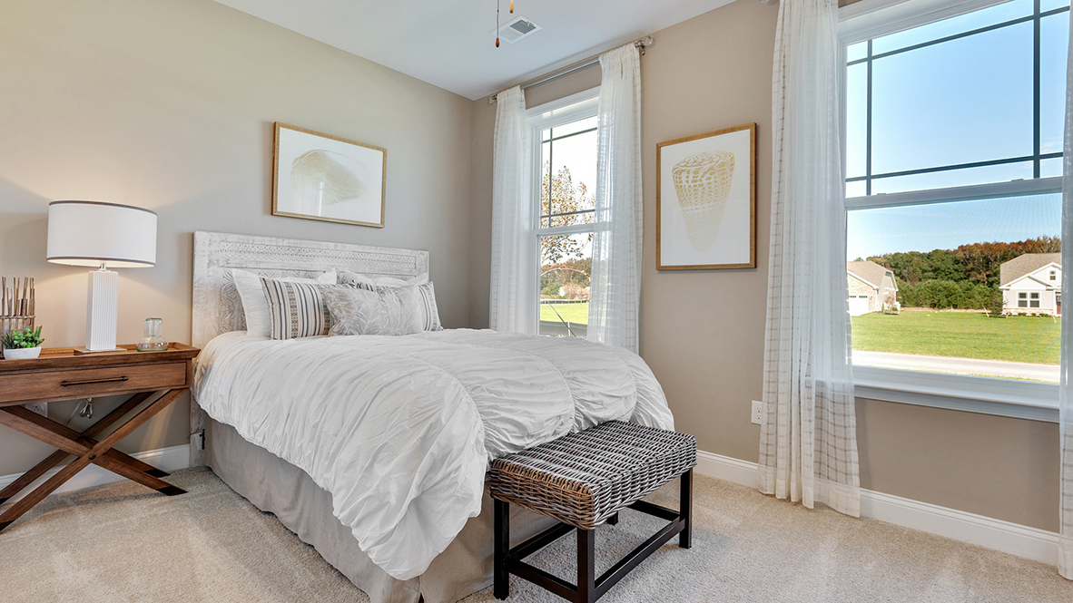 Two additional bedrooms are located on the main level sharing the second bathroom.