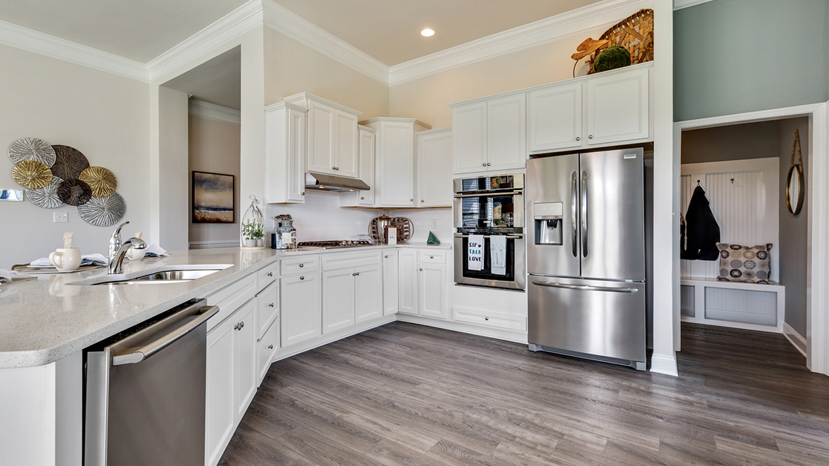 Enjoy cooking and entertaining in your spacious gourmet kitchen with stainless steel appliances.