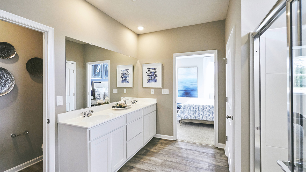 The private bathroom has a walk-in closet.