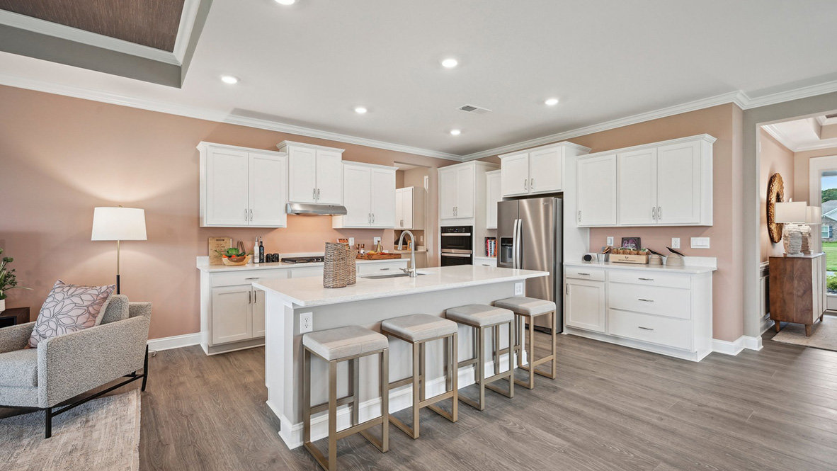 There are classic kitchen cabinets in the gourmet kitchen.