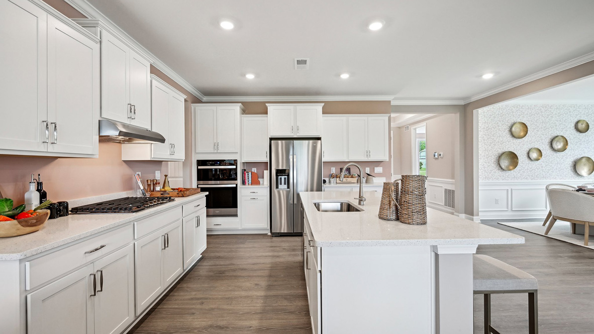 The kitchen has stainless steel appliances.