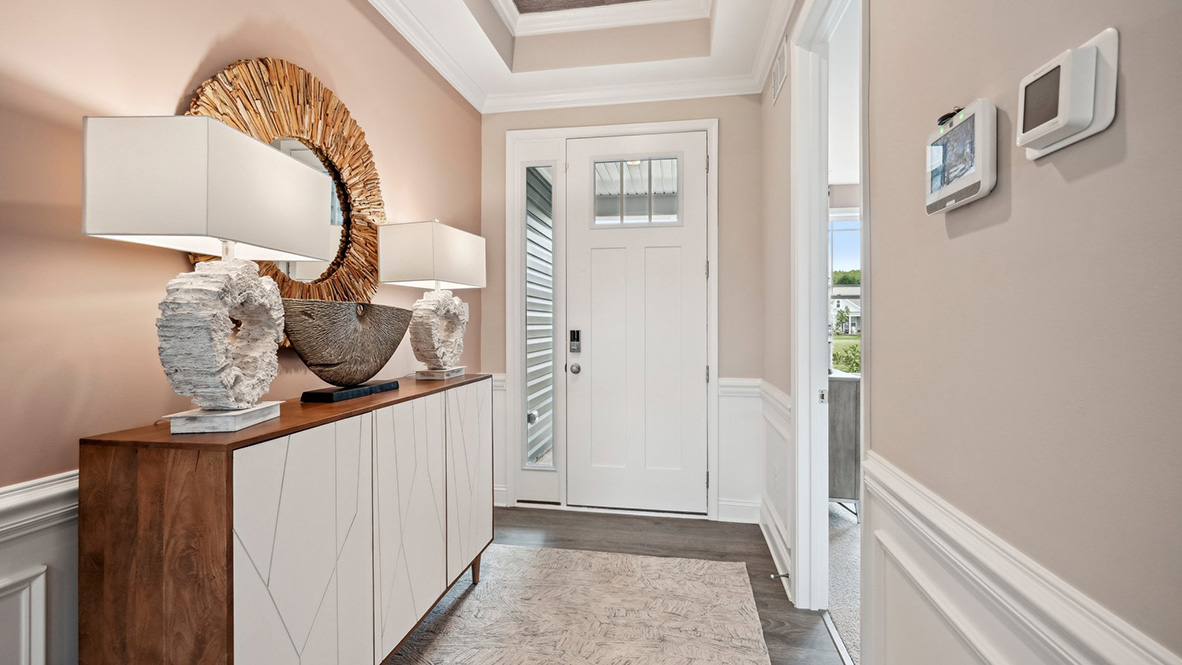 The foyer connects to the dining room and flex room.