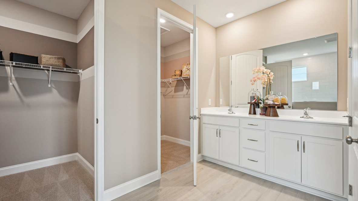 Two walk-in closets are in the main bedroom.