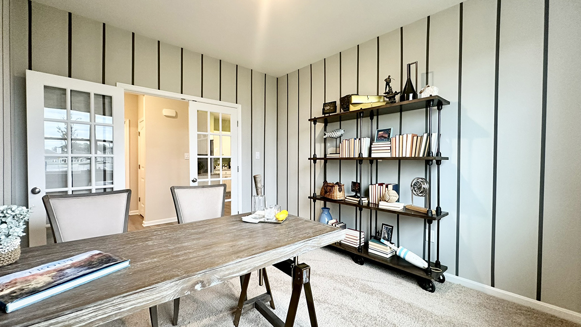 Stylish French doors give an abundance of natural light in the flex room.